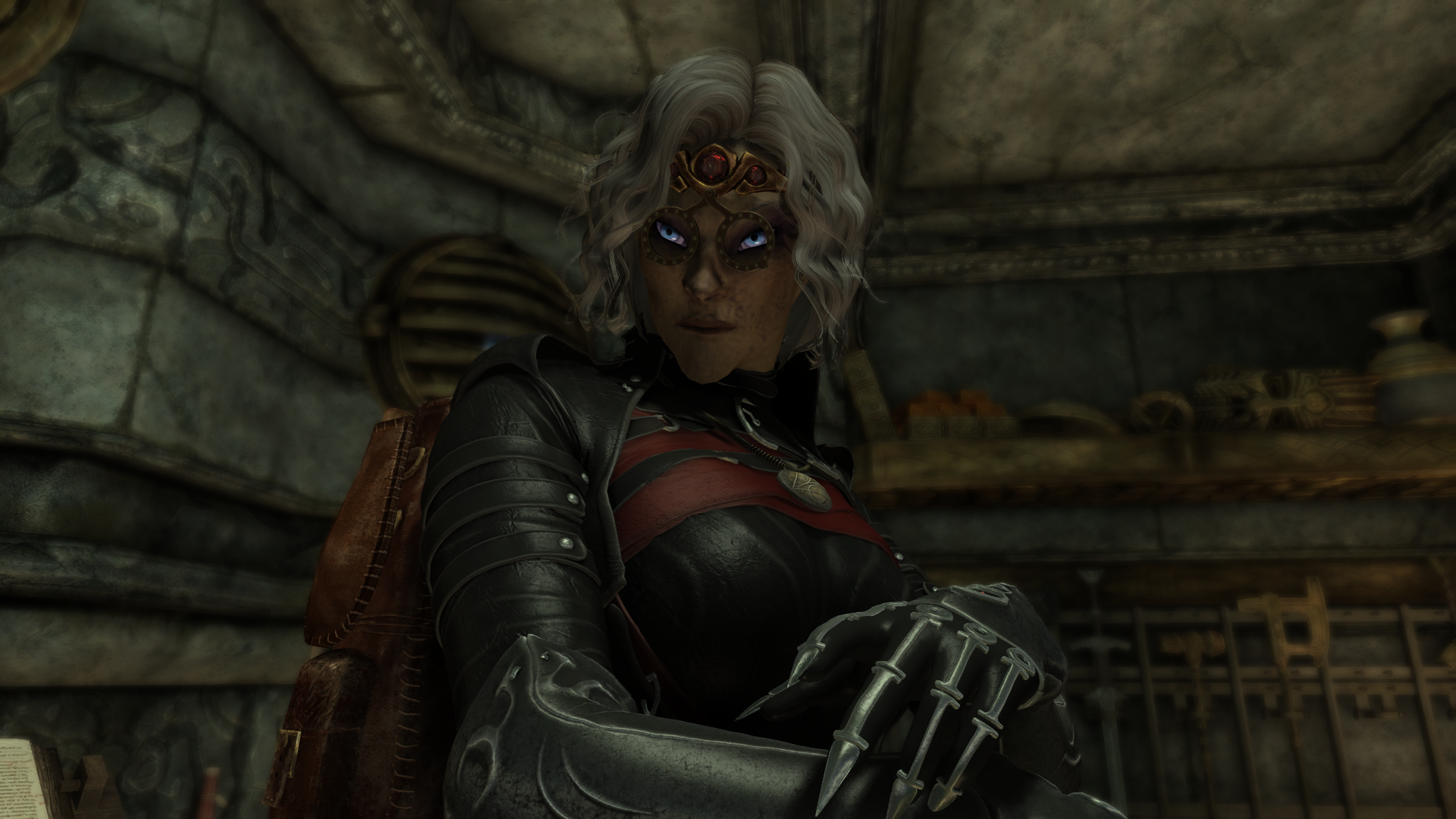 My vampire player character, Elizabeth Grimscythe.  She is a high-elf with striking features, nearly white short hair and bold blue eyes.  Currently wearing a circlet and the "Ahlanna" outfit mod in a red and black color scheme.